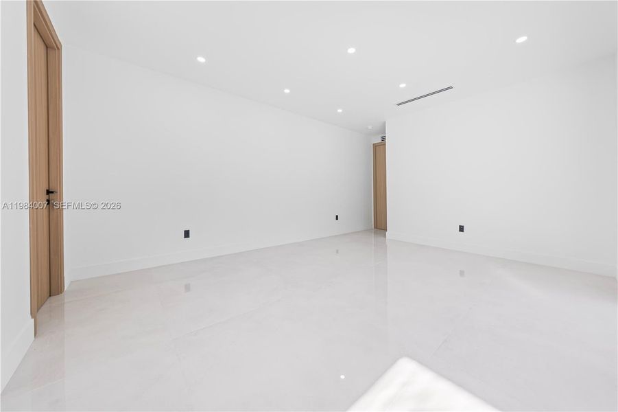 Spacious, unfurnished interior of a new home in , North Miami (Image 52).