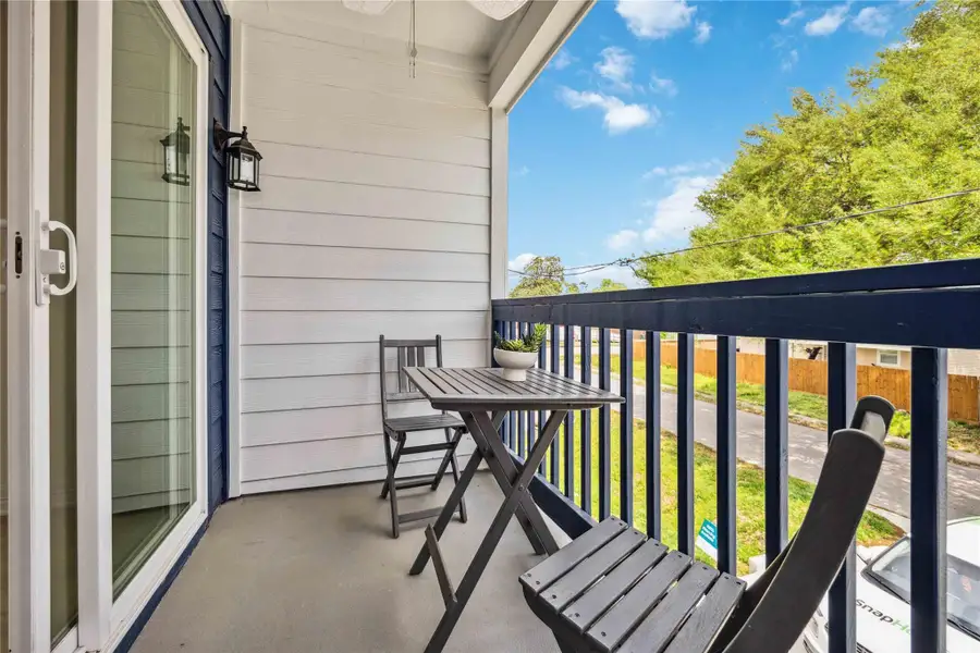 Enjoy an elevated perspective from the second-floor balcony, an ideal spot for a morning coffee or a breath of air between virtual meetings.