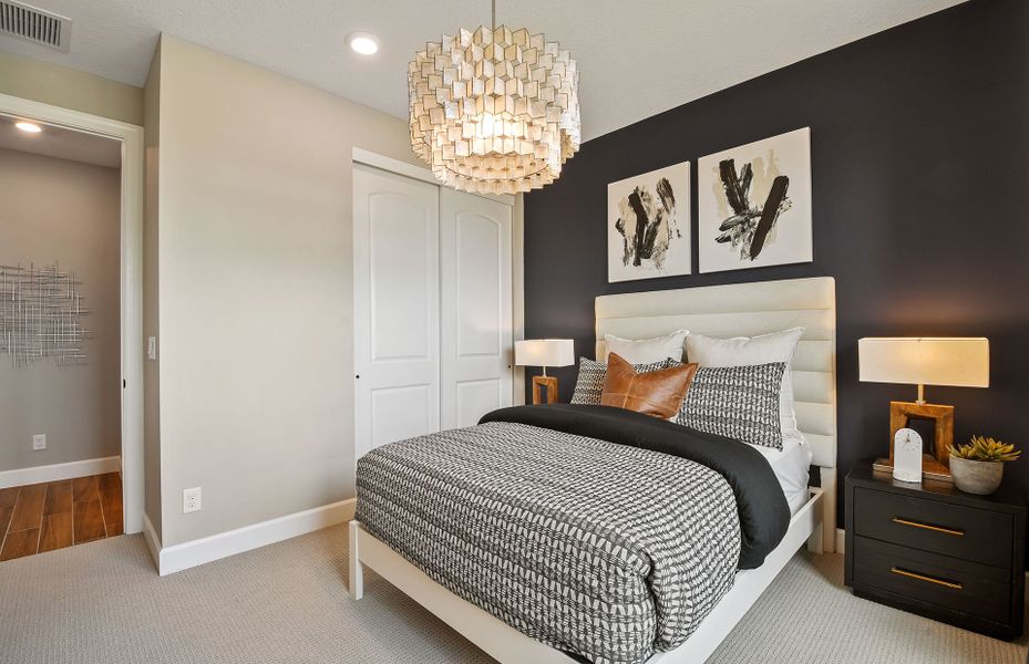 Representative furnished interior of a home built from the Palmary by DiVosta in Talon Preserve on Palmer Ranch, Nokomis (Image 12).