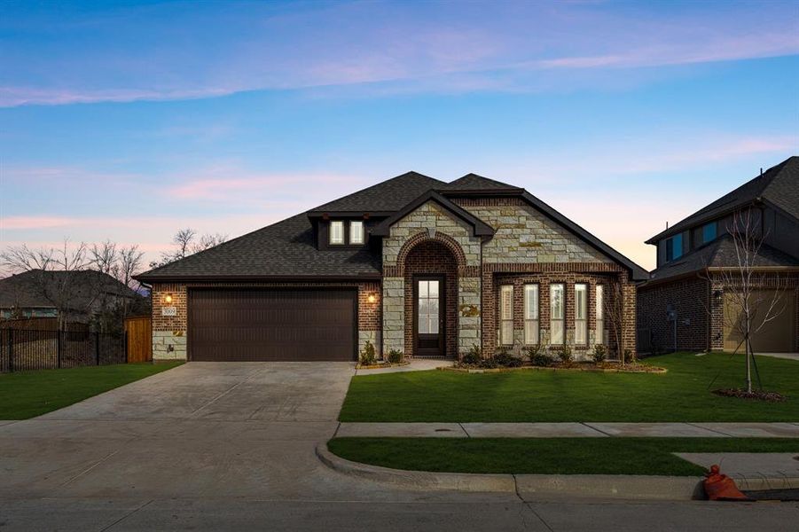 Front exterior of a new home in Liberty, Melissa, TX, highlighting curb appeal (Image 2).
