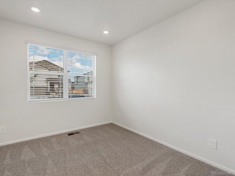 Spacious, unfurnished interior of a new home in Buffalo Highlands: The Flora Collection, Commerce City (Image 18).