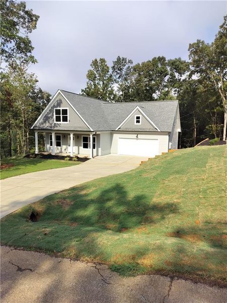 Front exterior of a new home in , Franklin Springs, GA, highlighting curb appeal (Image 1).