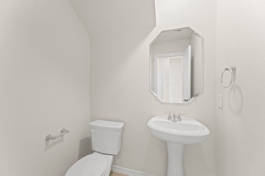 Front exterior of a new home in Sanger Circle, Sanger, TX, highlighting curb appeal (Image 14). Front exterior of a new home in Sanger Circle, Sanger, TX, highlighting curb appeal (Image 14).