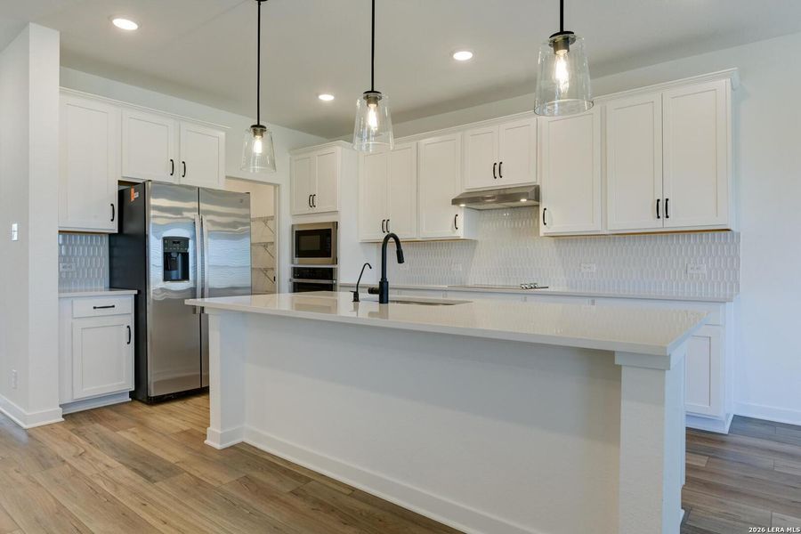 Furnished interior view inside a new home in Hennersby Hollow, San Antonio (Image 10).