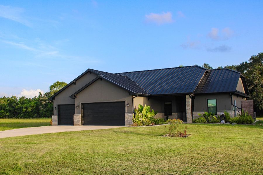 Front exterior of a new home in , Angleton, TX, highlighting curb appeal (Image 2). Front exterior of a new home in , Angleton, TX, highlighting curb appeal (Image 2).