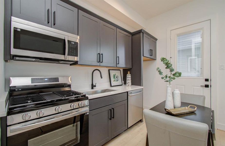 Your home comes with a standard studio apartment that features a stacked washer/dryer. Full gas range, vented microwave, a dishwasher and a fridge. Suitable for out of town visitors, home office, or rental opportunities.