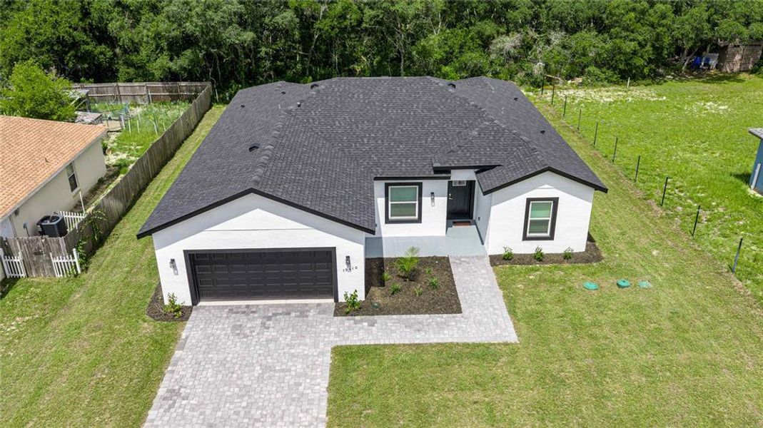 Front exterior of a new home in , Ocala, FL, highlighting curb appeal (Image 21).