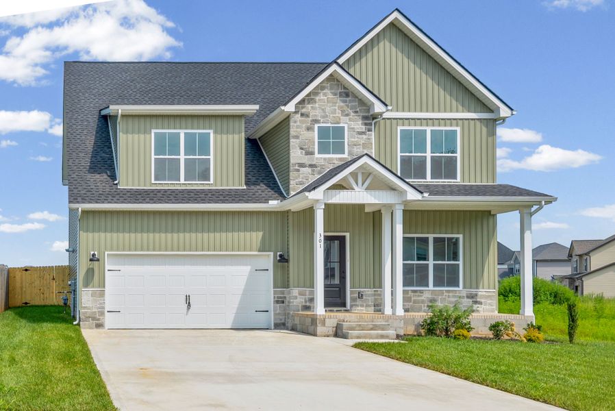 Front exterior of a new home in Summerfield, Clarksville, TN, highlighting curb appeal (Image 26).