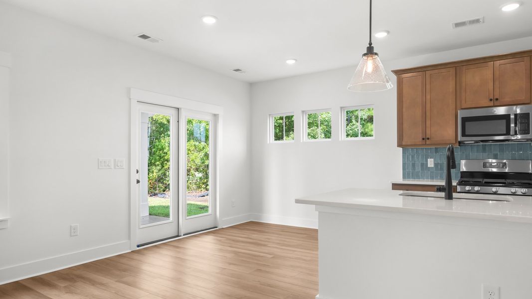 Furnished interior view inside a new home in Bluffs at Sun Colony, Longs (Image 9).