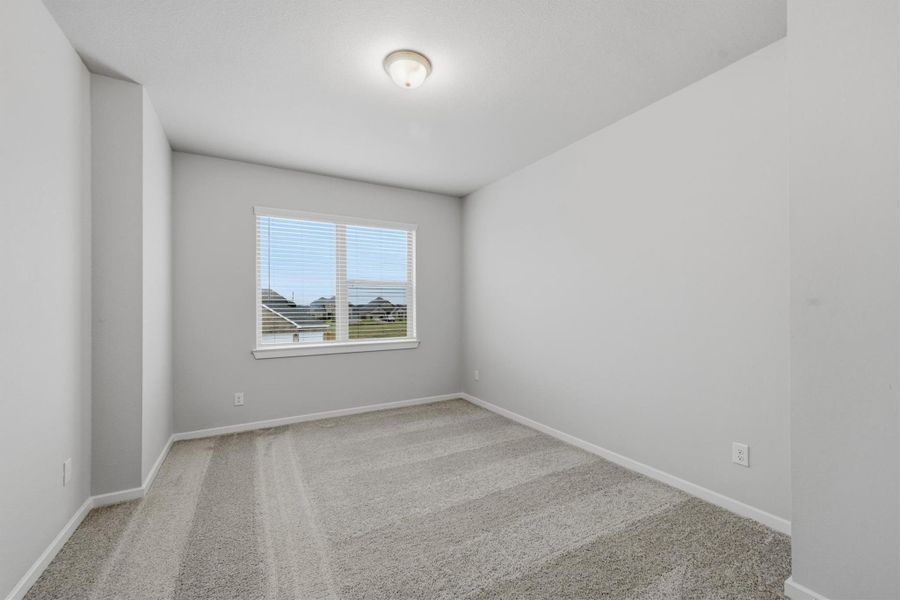 Spacious, unfurnished interior of a new home in Canterra Creek  60', Iowa Colony (Image 36).