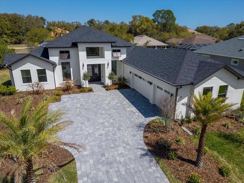 Front exterior of a new home in , Palm Coast, FL, highlighting curb appeal (Image 2). Front exterior of a new home in , Palm Coast, FL, highlighting curb appeal (Image 2).