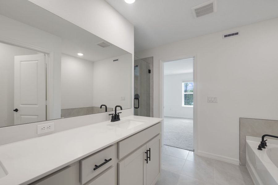Furnished interior view inside a new home in Towns at Riverwalk, Sanford (Image 10).