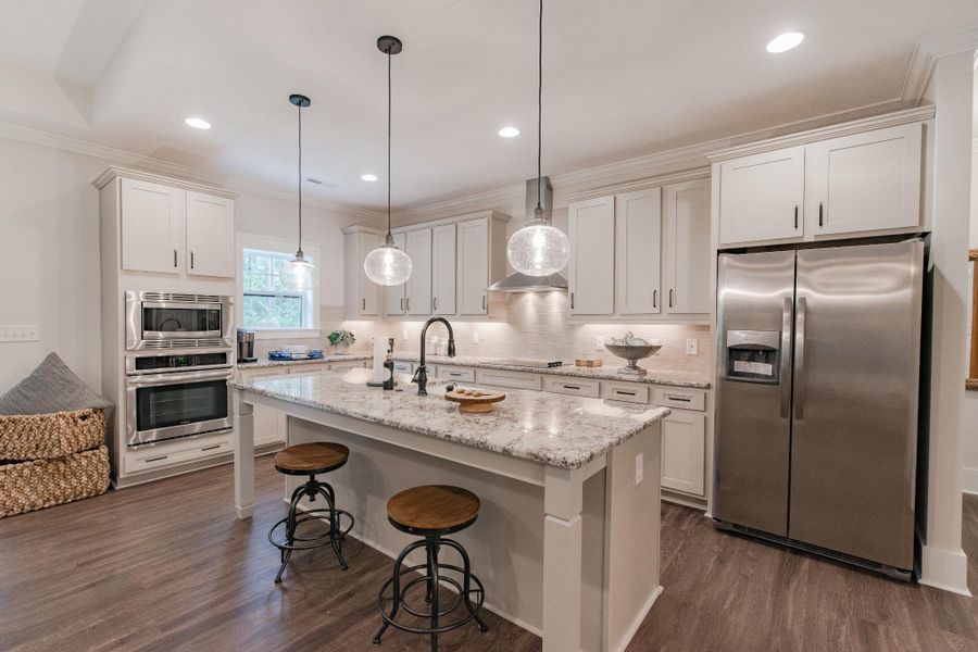 Representative furnished interior of a home built from the McKinley by Bill Clark Homes in The Sanctuary at Sunset Beach, Sunset Beach (Image 10). Representative furnished interior of a home built from the McKinley by Bill Clark Homes in The Sanctuary at Sunset Beach, Sunset Beach (Image 10).