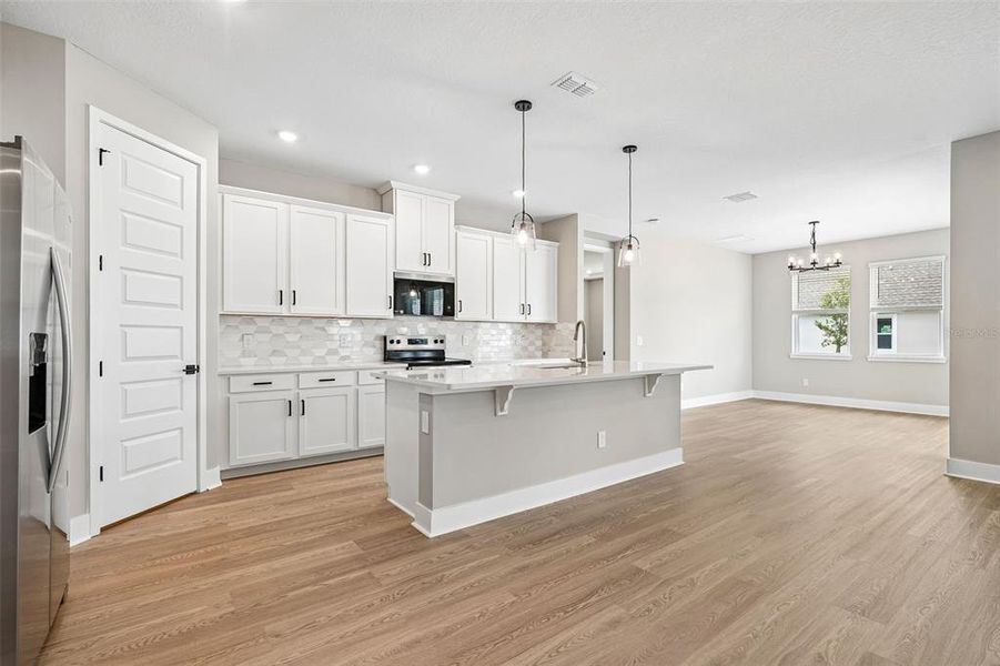 Furnished interior view inside a new home in Legends Preserve - Signature Series, Daytona Beach (Image 12).