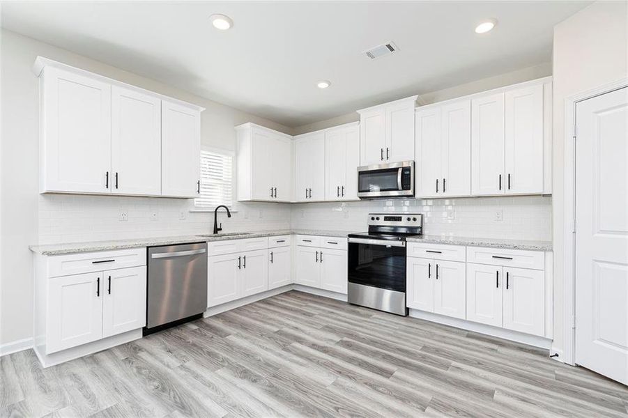 Furnished interior view inside a new home in Lake Preserve at Jackson Trail, Jefferson (Image 6).