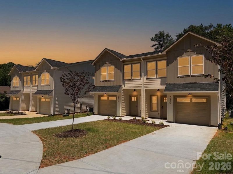 Front exterior of a new home in , Charlotte, NC, highlighting curb appeal (Image 24).