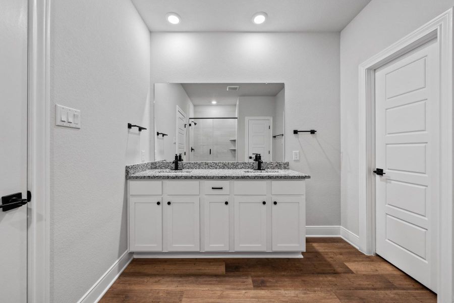 Furnished interior view inside a new home in TRACE, San Marcos (Image 7).