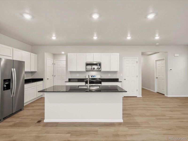 Furnished interior view inside a new home in Lake Bluff, Greeley (Image 6).