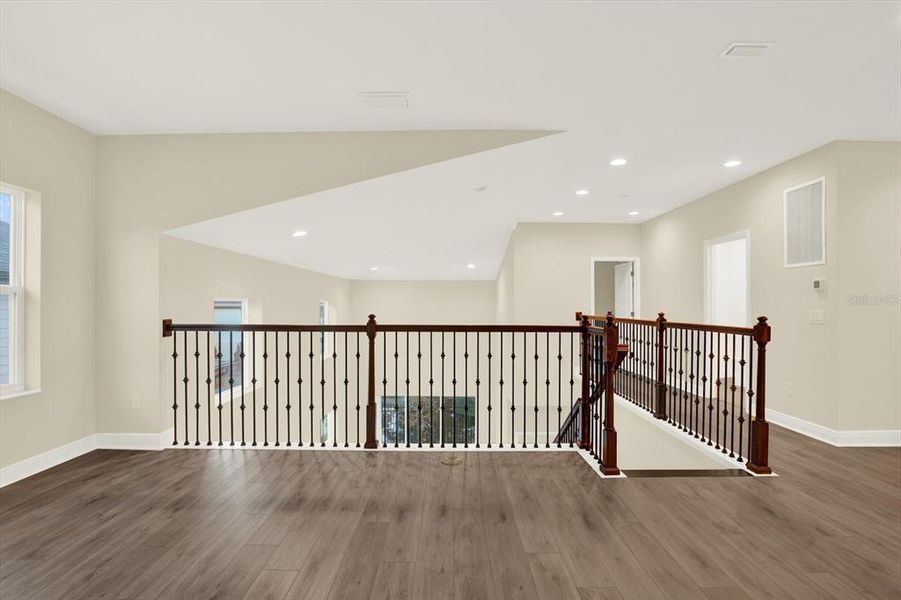 Spacious, unfurnished interior of a new home in The Towns At Long Bayou, Seminole (Image 29).