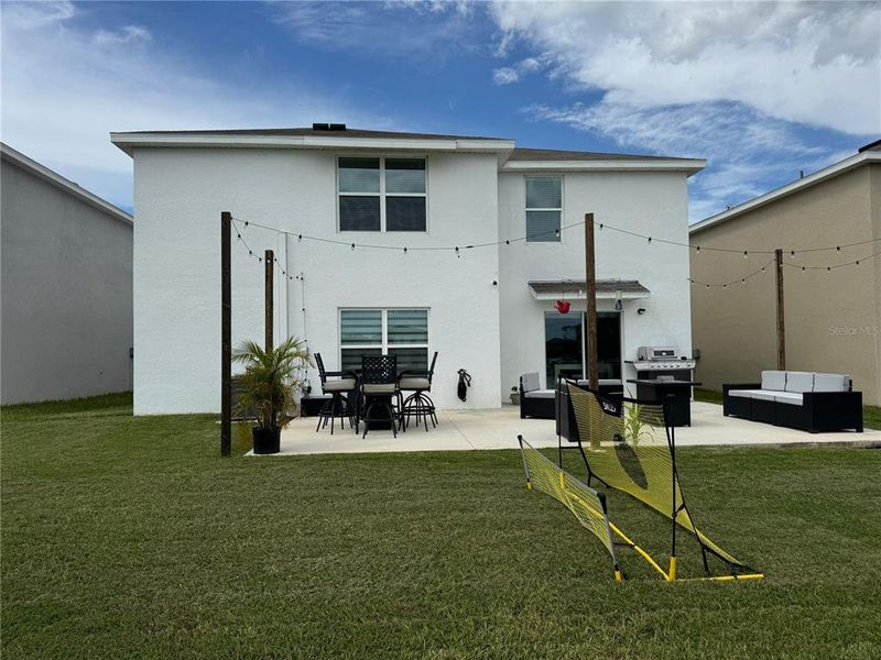 Front exterior of a new home in Zephyr Ridge, Zephyrhills, FL, highlighting curb appeal (Image 22).