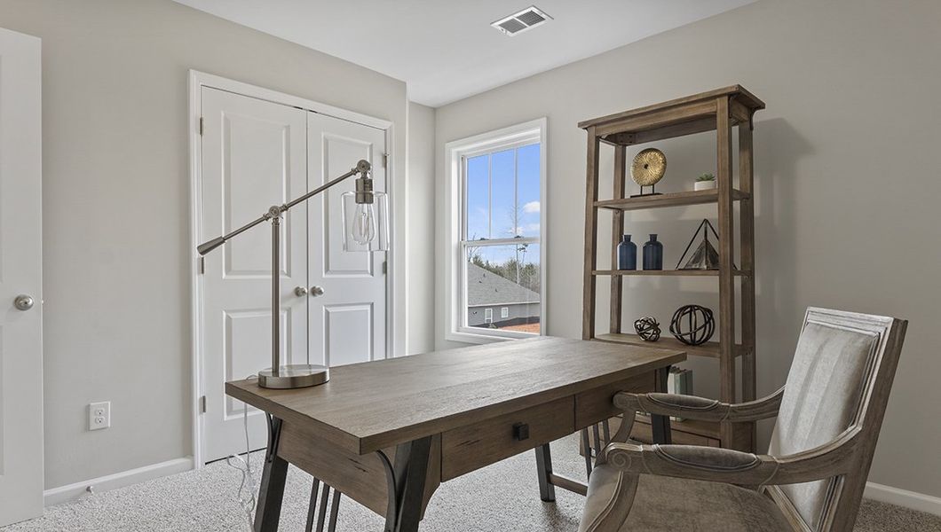Representative furnished interior of a home built from the Summit by D.R. Horton in Harrison Valley, Simpsonville (Image 23).