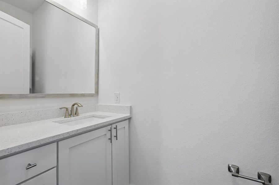 Bathroom featuring vanity