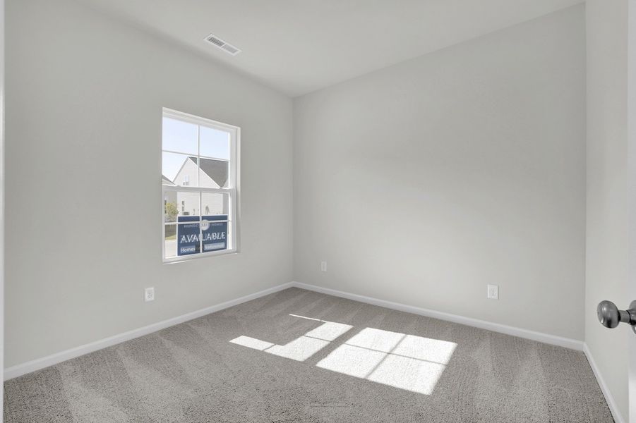 Spacious, unfurnished interior of a new home in River Tide Farms, Bolivia (Image 20).