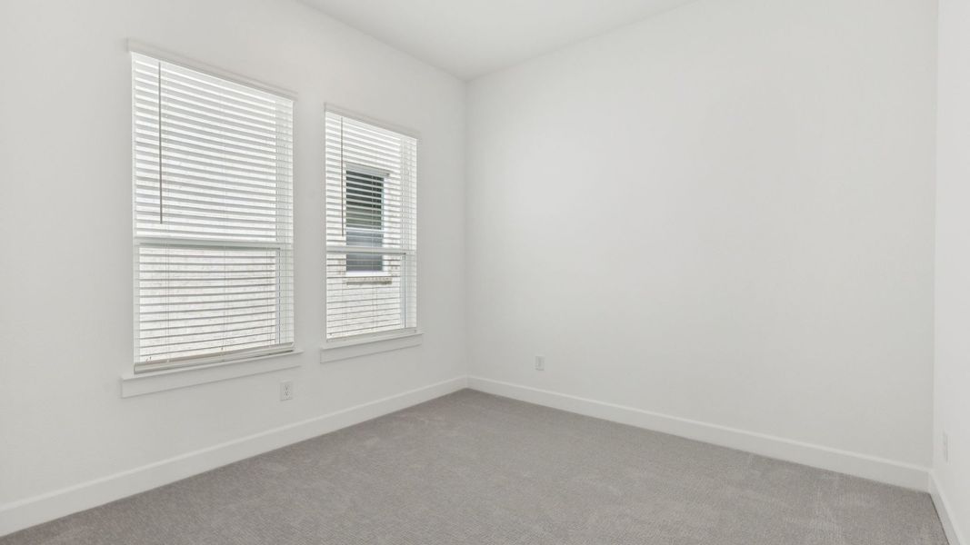 Representative unfurnished interior of a home built from the Elise by Normandy Homes in Rainwater Crossing, Celina (Image 12).
