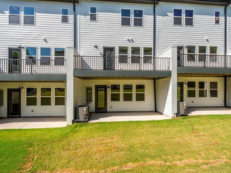 Front exterior of a new home in Archer Row, Charlotte, NC, highlighting curb appeal (Image 22).