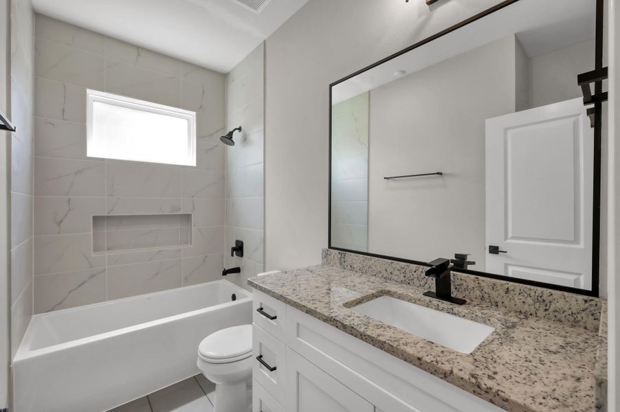 Furnished interior view inside a new home in Spring Branch Crossing, Conroe (Image 17).