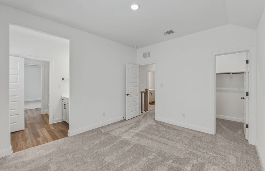 Representative unfurnished interior of a home built from the Woodland by Pulte Homes in Santa Rita Ranch, Liberty Hill (Image 20).