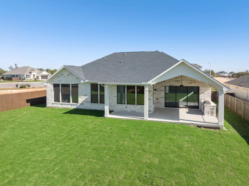 Exterior details and patio area of a home in Riverstone, Georgetown (Image 25).