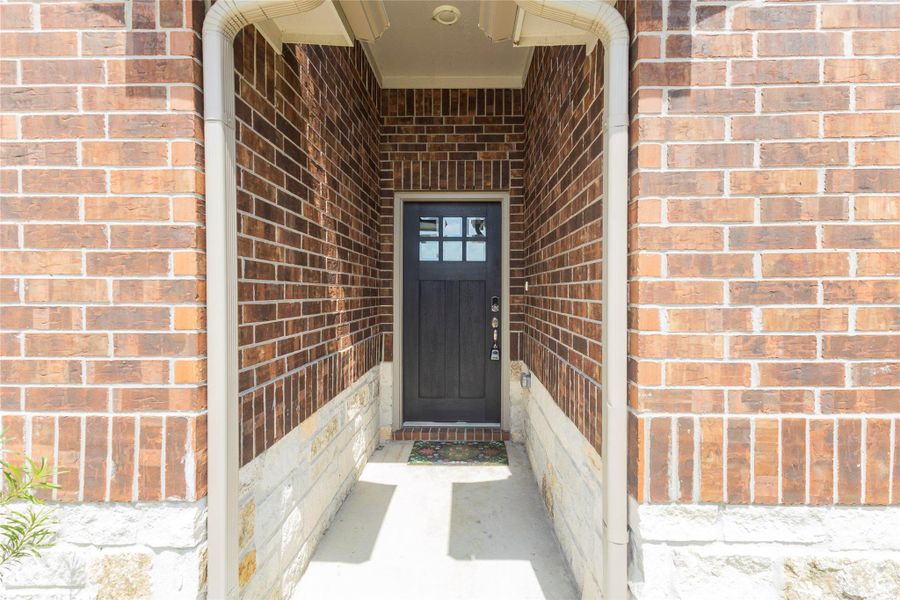Exterior details and patio area of a home in Sundance Cove - Classic Series, Crosby (Image 4).