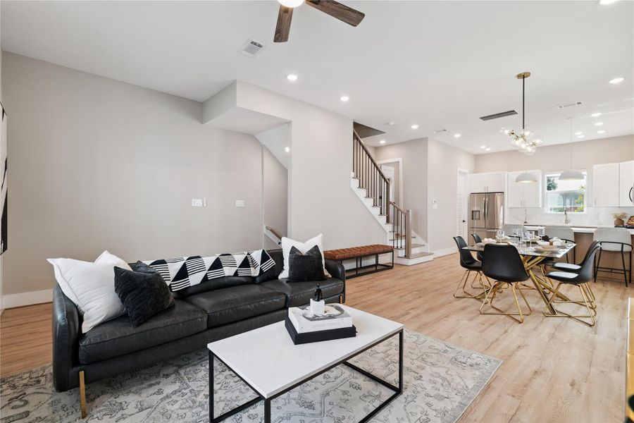 A volume-driven layout with intuitive flow—this central floor merges kitchen, dining, and living under one unified ceiling plane.
