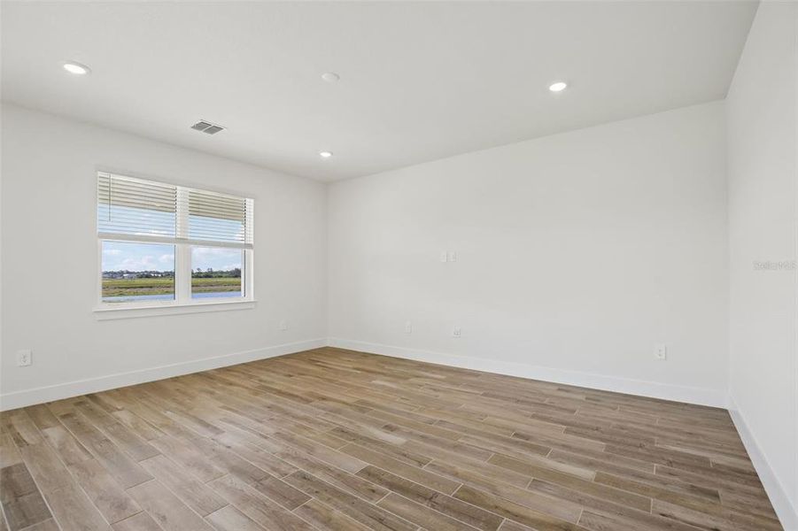Spacious, unfurnished interior of a new home in Magnolia Bay - Reserve Series, Nokomis (Image 19). Spacious, unfurnished interior of a new home in Magnolia Bay - Reserve Series, Nokomis (Image 19).