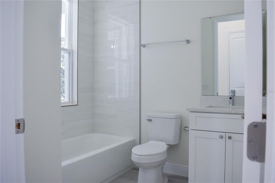 Furnished interior view inside a new home in , Lake Alfred (Image 28).