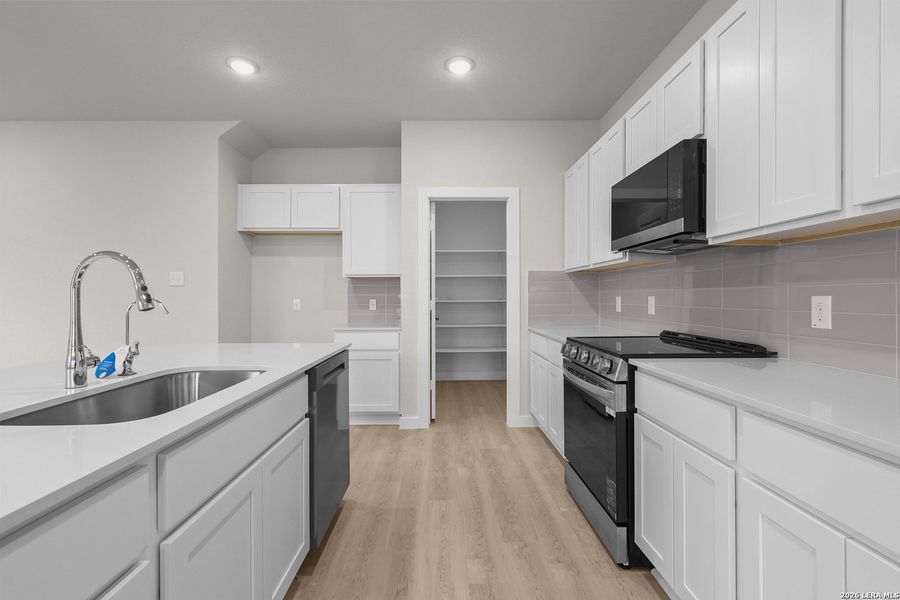 Furnished interior view inside a new home in Millican Grove, San Antonio (Image 12).