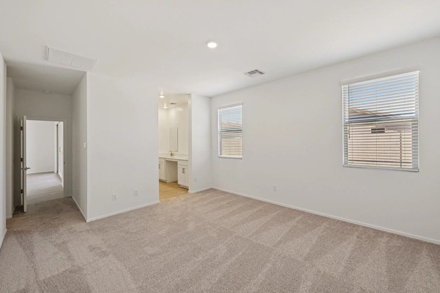 Primary suite. Not actual home, finishes and options may vary by community.