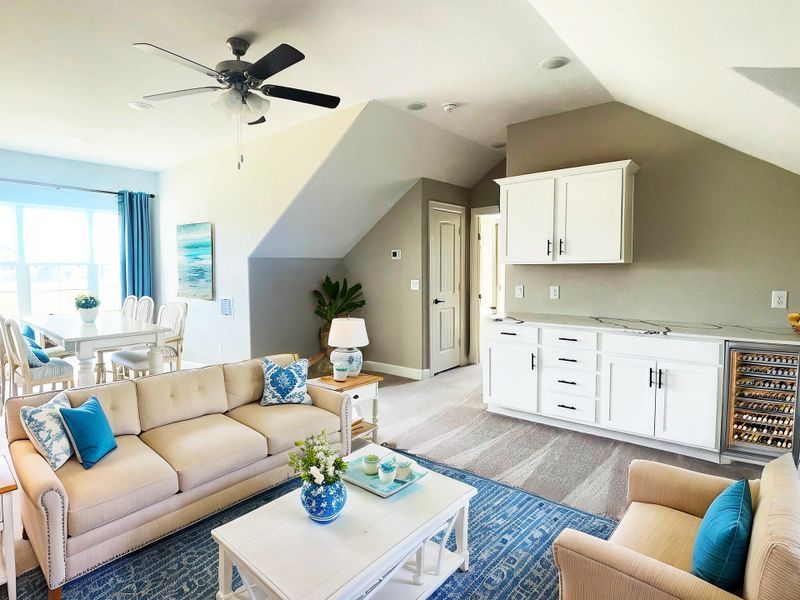 This Bonus Room is perfect for accommodating guests, creating a private retreat, or setting up a productive workspace. This thoughtfully designed space features a cozy living area, full bathroom, full and a full bedroom, ensuring comfort and convenience.  *Image depicts home as is with some elements virtually staged.