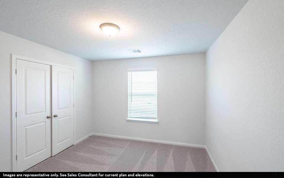 Another generously sized bedroom featuring ample closet storage, soft carpeting, and inviting natural light, ideal for comfortable everyday living. **Photos are representative only and may vary as built.** Another generously sized bedroom featuring ample closet storage, soft carpeting, and inviting natural light, ideal for comfortable everyday living. **Photos are representative only and may vary as built.**