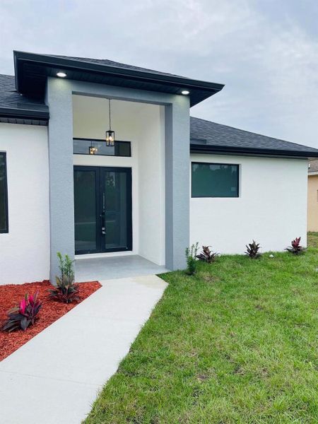 Exterior details and patio area of a home in , Lehigh Acres (Image 3). Exterior details and patio area of a home in , Lehigh Acres (Image 3).