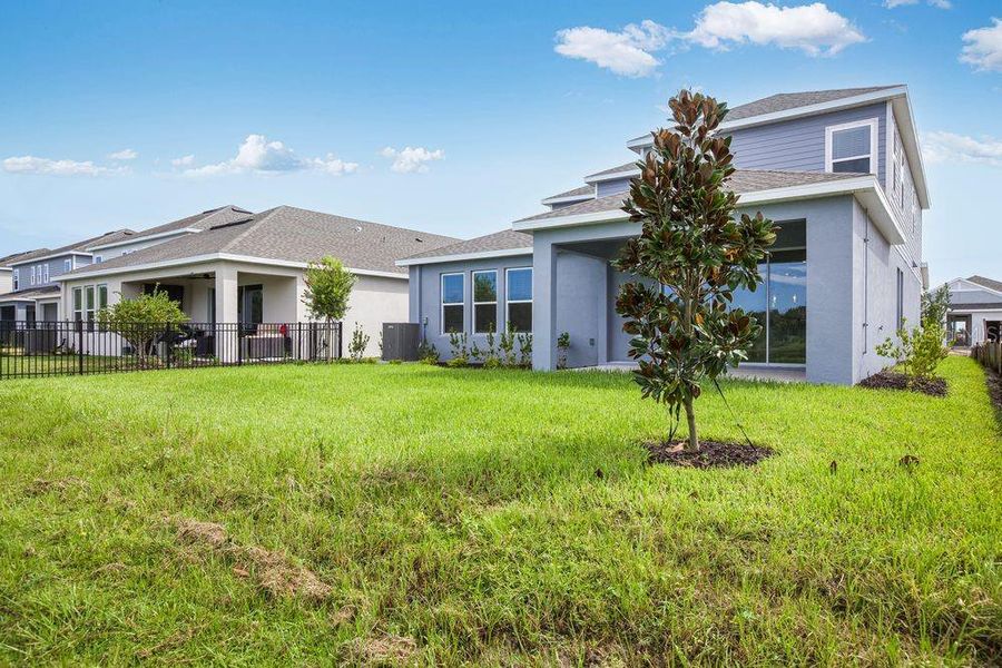 Exterior details and patio area of a home in Indigo Creek, Apollo Beach (Image 29).