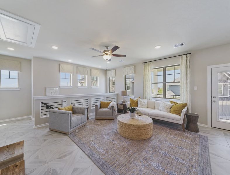 Representative furnished interior of a home built from the Storybrooke by Chesmar Homes in Sienna Courtyard, Missouri City (Image 5).