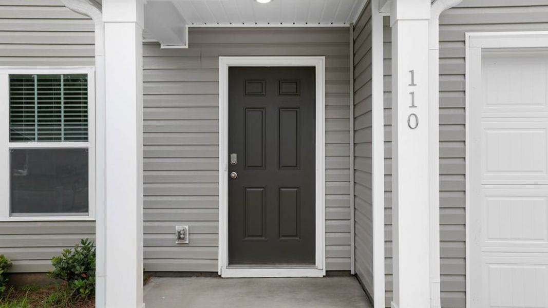 Exterior details and patio area of a home in Bentley Park, Greenwood (Image 2). Exterior details and patio area of a home in Bentley Park, Greenwood (Image 2).