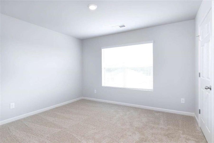Spacious, unfurnished interior of a new home in The Reserve at Calcutta, Stockbridge (Image 30).