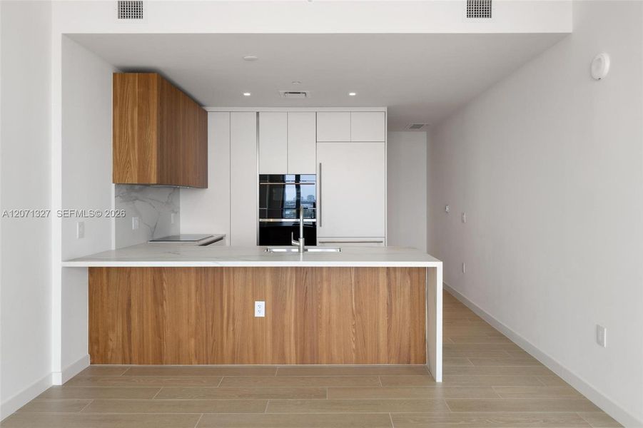 Furnished interior view inside a new home in , Miami (Image 10).