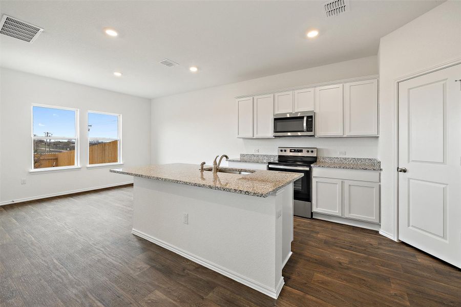 Furnished interior view inside a new home in Palomino, Manor (Image 11).