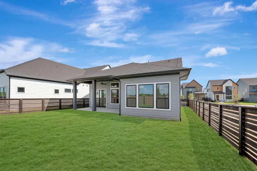Exterior details and patio area of a home in Bridgeland Central: Emerald Heights - Enclave Collection, Cypress (Image 3).
