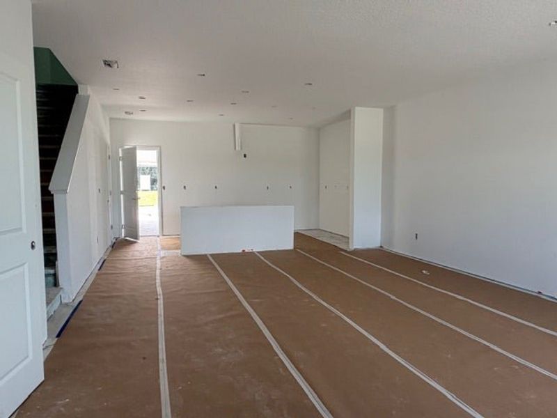 In-progress construction of a new home in Whaley Grove Townhomes, St. Cloud, FL (Image 10).