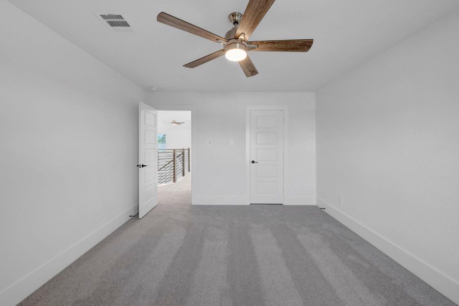 Spacious, unfurnished interior of a new home in Lone Star Landing, Montgomery (Image 41).